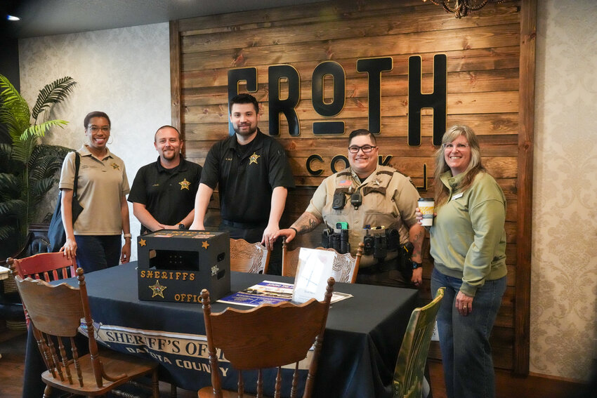 The DCSO staff members that participated in the Coffee with a Cop community event at Froth and Cork in Hastings with Hastings resident Theresa Chatelle. Left to Right, Community Relations and Equity Coordinator Genesis Sudderth, Sergeant Klug, Correctional Deputy Mills, Deputy Martin and Theresa Chatelle.