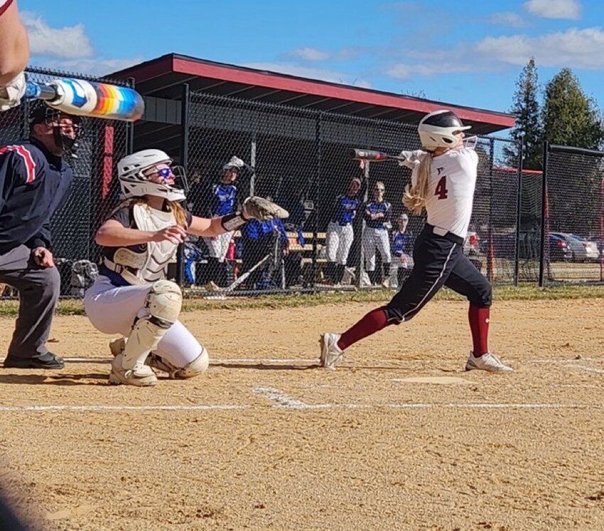 Leadoff hitter Kelsey Sterud drives one to the outfield. She and the rest of the Cardinals will look to advance to the state tournament this week.