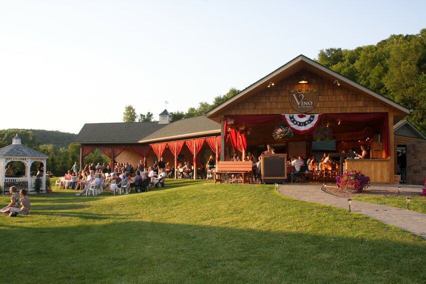 Vino in the Valley, on the edge of the Rush River southeast of Ellsworth, attracts over 30,000 people to their outdoor dining pavilion each season.