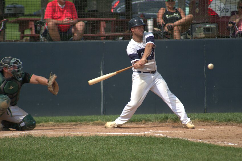 Cody Holden takes a hearty cut in Elmwood&rsquo;s 8-6 win over Bay City on Sunday, July 14.