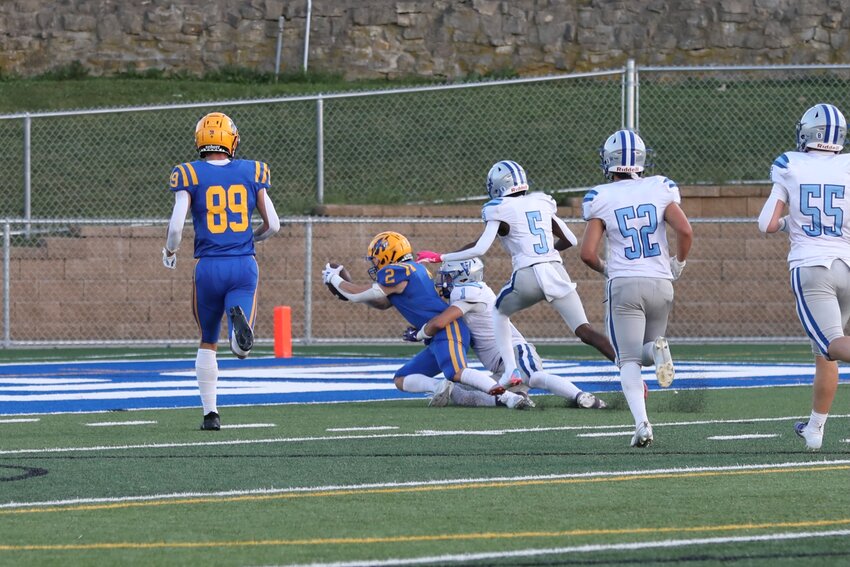 Johnny Vickney caught his first varsity touchdown pass, a 38-yard pass from Lukas Foss. This was also Foss’s first touchdown pass of the season. Vickney made the catch at the 9-yard line with two defenders on him and he carried the defenders with him to the goal line.