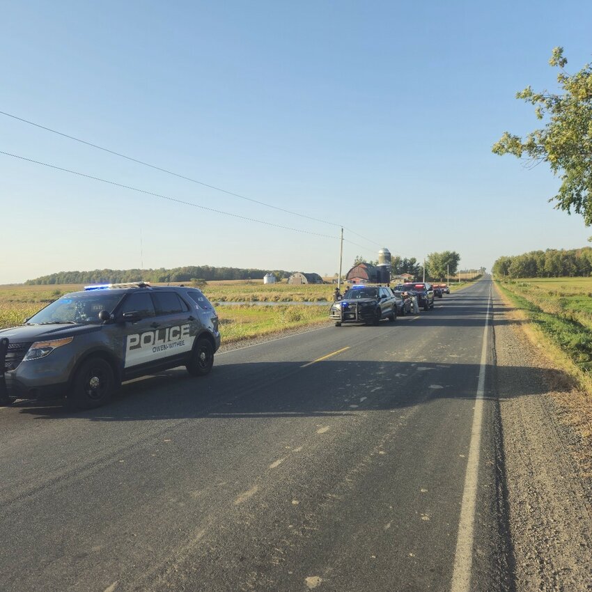 Police cars surround Kyle Borsien’s vehicle after a high speed pursuit.