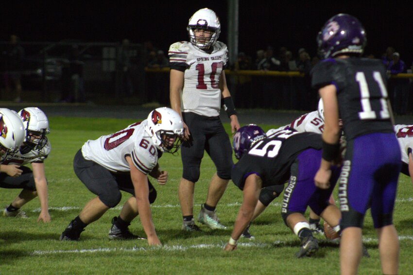 Cade Stasiek surveys the field in a 19-18 win over Boyceville on Oct. 11