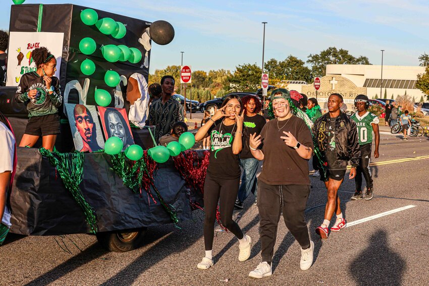 Park High students makes their way past St. Rita's during the homecoming parade.