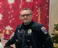 Prescott (Wis.) police officer Steve Williams has been placed on administrative leave after allegedly making 