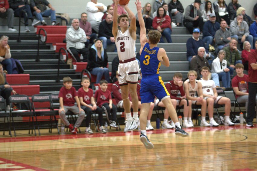 Max Monteith takes a shot from the corner in Prescott&rsquo;s 83-77 win over Hastings on Dec. 3.