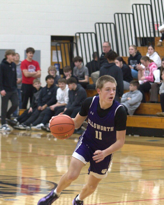 Omar Coulson makes a move toward the basket in a 74-60 win over Cadott on Dec. 27.