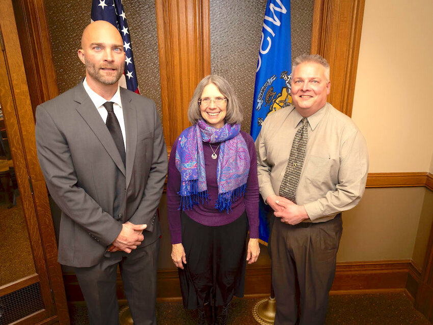 Attending the State of the State Address with 69th State Assembly Representative Karen Hurd (center) were Abbotsford Superintendent Ryan Bargender (left) and Clark County Sheriff Kerry Kirn (right).