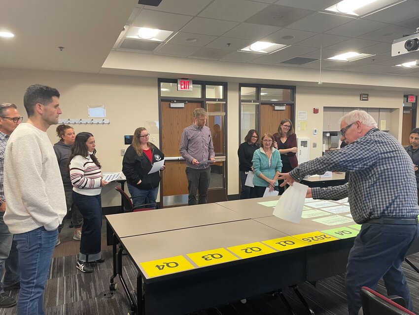 Opioid Prevention Program Coordinator James Johnson Jr. walks members through placing action steps for each of ORAC’s goals on the calendar for the next two years.