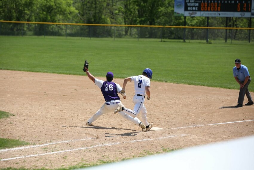 Ellsworth&rsquo;s Nolan Kummer stretches out to make a play at first a season ago against Saint Croix Central.