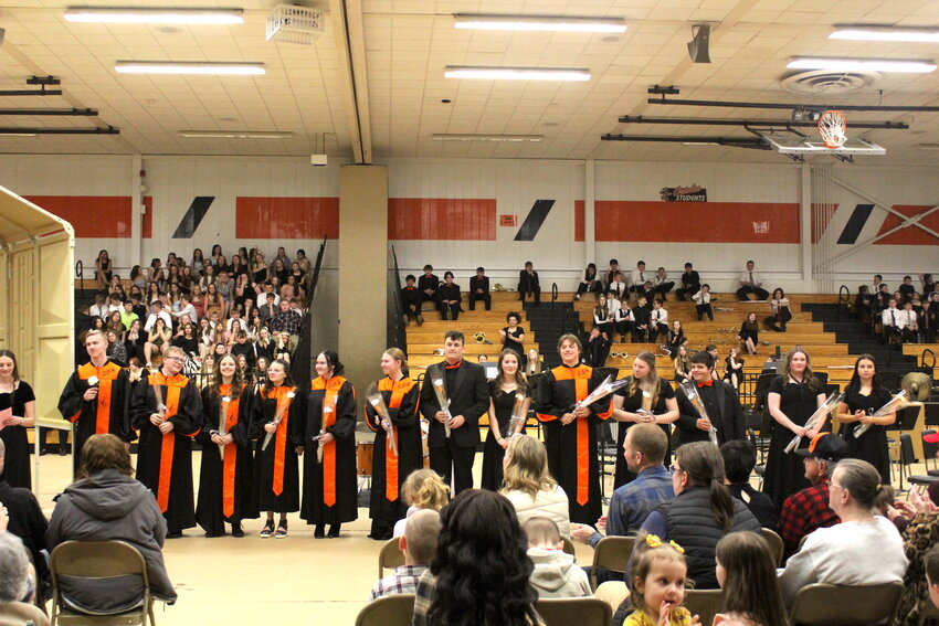 The spotlight was placed on the featured Stanley-Boyd seniors, who were recognized and celebrated for their dedication and achievements throughout their Choir and Band careers.  From left: Landen Fredrickson, Seth Zastrow, Jayme Yates, Rachel Kastel, Brooke Kane, Sydney Gundlach, Chezny Harris, Marie Henderson, Carter Isenberger, Scarlet Kadolph, Robert Sayles, Kylie Weiland, and Mykel Wirtala.