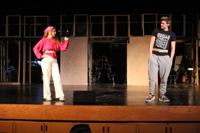 Emma Woodhouse (Sasha McCauley) and Mr. Knightley (Lex Hidlebaugh) interact on the set for "Emma: A Pop Musical" at Park High. The drama debuts April 25 at 7:00 pm.