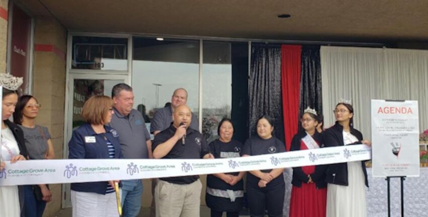 David Vang speaks at a ribbon cutting for held on Saturday April 12. Vangz Kitchen offers Asian cuisine and is located at 8711 East Point Douglas Road South, Suite 103, off Jamaica Avenue in Cottage Grove.