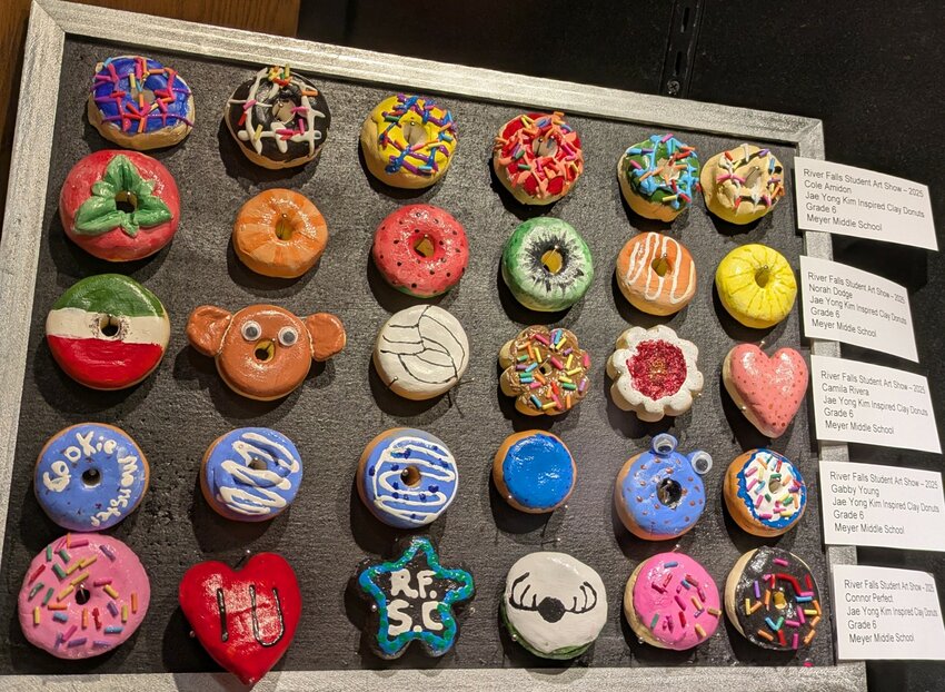 Meyer Middle School sixth grade artists created Jae Yong Kim-inspired clay doughnuts for the 2025 Student Art Show.