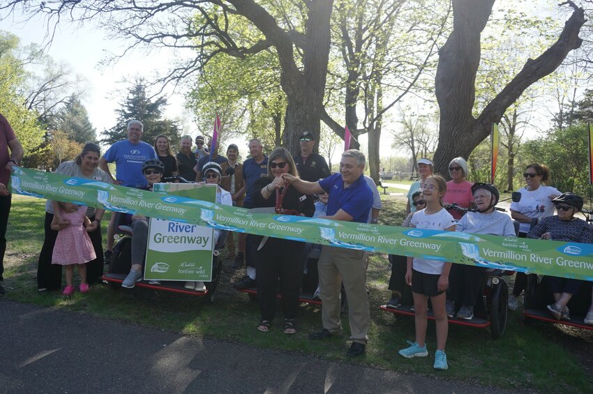 Seniors in Trishaws came for the ribbon cutting of the Vermillion River Greenway.
