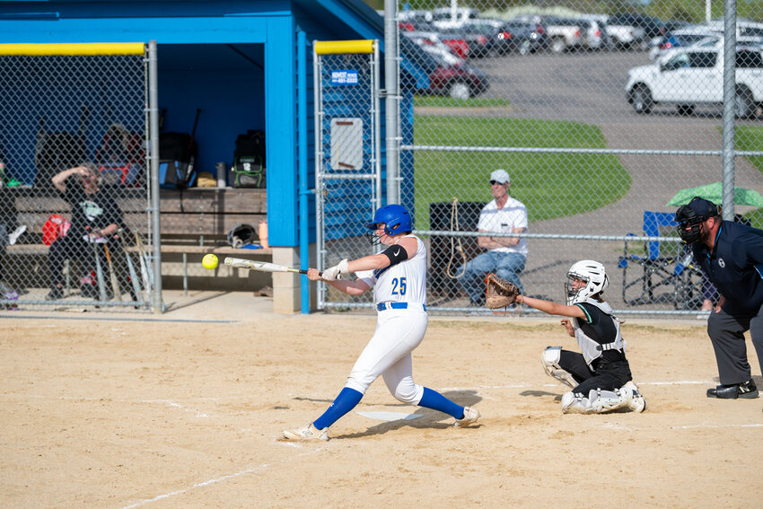 Ella Hauschildt drives a single through the left side during Hastings’ big third inning against Hill-Murray. The Raiders piled up six runs in the frame to break the game open.
