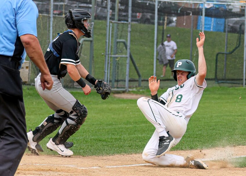 Park sophomore Esten Erickson slides into home against Roseville Friday.