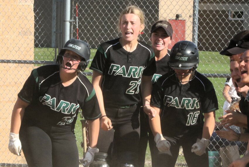 158 -- Park teammates cheer on Mackenzie Darsow as she comes home in the fourth inning after socking a two-run homer to tie the game at 4-all.