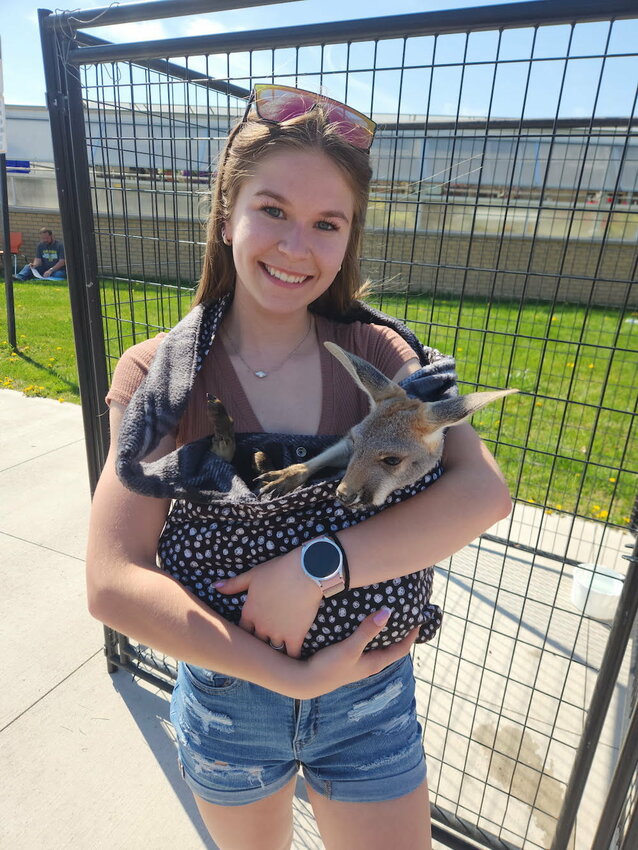 A sweet lamb brought smiles as students learned about farm animals and their role in the ecosystem.
