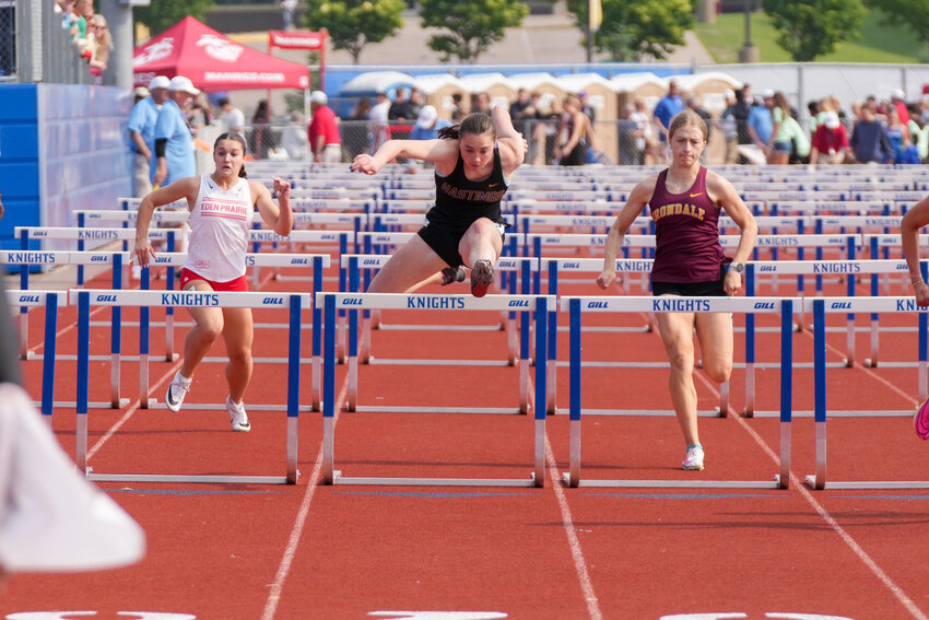 Ellie Magnus crosses the finish line in the 100-meter prelims, clocking 12.36 seconds and placing just outside the finals cutoff in 10th place.
