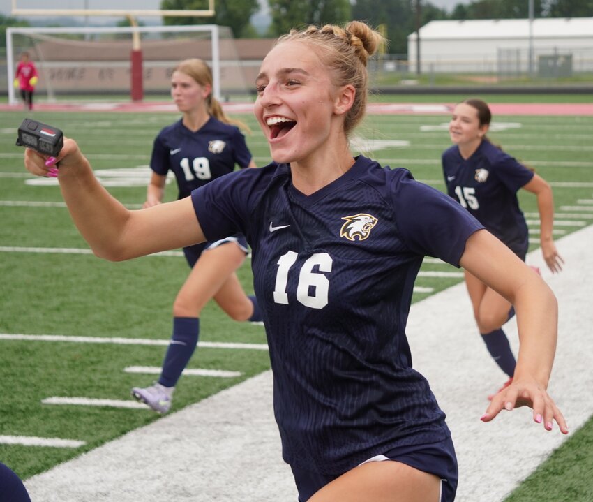 River Falls senior Addison Reisdorfer runs onto the field after the 3-0 section final win over Onalaska to celebrate with her teammates on Saturday. The Wildcats are headed to the WIAA state soccer tournament for the fourth time in school history. They will play Pewaukee on Friday at 4:30 p.m. in Milwaukee.