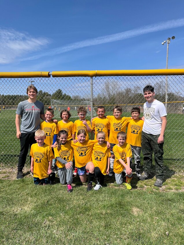 Alessio Venturini (back left) stands for a photo with the U10 soccer team that he coached with Stanley-Boyd Senior Carter Isenberger (back right) in the Lafeyette Parks and Recreation Spring 2025 Soccer League.