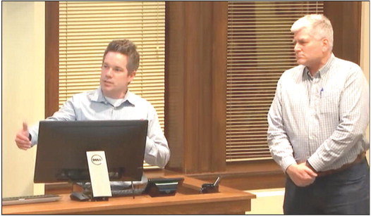 Hastings Interim Public Works Director Ryan Stempski talked about how vital Mark Peine (right) has been to city operations over his 35-year career. Peine retires Jan. 31. He was honored with a proclamation by the Hastings City Council Jan. 17. Photo courtesy of Hastings Community TV