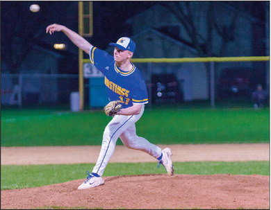 Aaron Vandehoef took the final inning for the Raiders against South St. Paul to close out the game earning his first Varsity win. Photo by Bruce Karnick