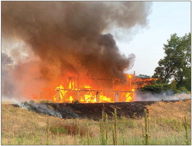 The fire that destroyed the clubhouse structure at Mississippi Dunes Golf Course in early August. Photo courtesy of Cottage Grove Public Safety.