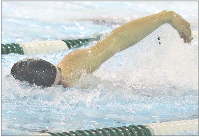 Mitchell LeMay won the 100-yard freestyle and set a new school record in the 50 freestyle with a 21.83 race. Photo by John Molene