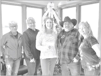 The Clark County Tavern League donated $2,000 to help victims of the tornado that hit Stanley on Wednesday, December 15. Their generosity will be matched with another $2,000 from the Tavern League of Wisconsin. Pictured are: Laura Speich, Clark County Tavern League Secretary, Dawn Burkhardt, Clark County Tavern League President, SamanthaHubbard, Forward Bank-Thorp Office Manager, who accepted the check on behalf of theStanley Community Association “Stanley Relief Fund”, Rick Truckey, Clark County Tavern League Director, and Kellie Hanson, Clark County Tavern League Treasurer and Safe Ride Coordinator. (Courtesy of Cindy Cardinal/O-W Enterprise)