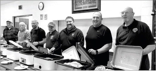 On call to help serve on Sunday at the Holy Family Brunch were (from right) were Terry Licht, Dean Lew, Jason Hazuga, Russ Pogodzinski, Jerry Dirkes, Bob Irwin, and Earl Meyer. Photo by Joseph Back.