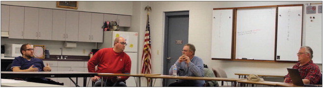 Representatives of Boyd and Stanley met at the First Avenue Stnaley Fire Hall to see if it might be possible to hash out an agreement on police services. From left to right are: Boyd trustee Casey Dorn; Village President Bob Geist; Stanley alderman Rick Hodowanic, and Mayor Al Haas. Present but not pictured were Lance Weiland; Nicole Thiel, and Holly Kitchell. Photo by Joseph Back.