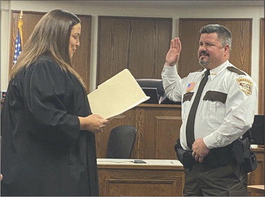 Pierce County Circuit Court Judge Elizabeth Rohl performed the oath of office for incoming Sheriff Chad Koranda on Friday, Dec. 30. He officially took office at midnight on Monday, Jan. 2. Koranda succeeds retired Sheriff Nancy Hove, who served in the role for 16 years.Photo courtesy of Judge Rohl