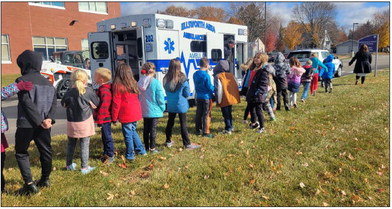 Ellsworth Elementary students had the opportunity to learn about different businesses at a special Touch a Truck Day Oct. 26. They met employees from Ellsworth Fire, the village, Ellsworth Police Department, Pierce Pepin Cooperative, Plummer Concrete and the Pierce County Highway Departments. Photos courtesy of Tami Place