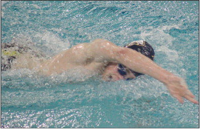 RFHS swimmer Alton Lesneski swims during the Boys 200 Yard Freestyle event during the dual meet with Tartan High School earlier this year. Lesneski finished first in the event, winning by less than one second. Photo by Reagan Hoverman