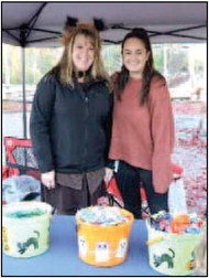 The River Falls Area Chamber of Commerce &amp; Tourism Bureau and SEEK Careers/Staffing hosted a candy table at Veterans Park in River Falls during the Main Street Trick or Treat event Friday, Oct. 29.