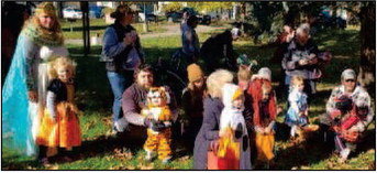Children ages 0-3 get ready for the Ellsworth Funsters Pump-kin in the Park costume contest at East End Park on Saturday, Oct. 30.