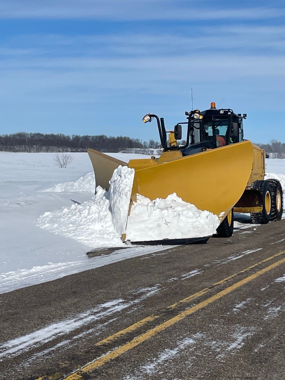 A Pierce County Highway Department grader on the job last week clearing snow.