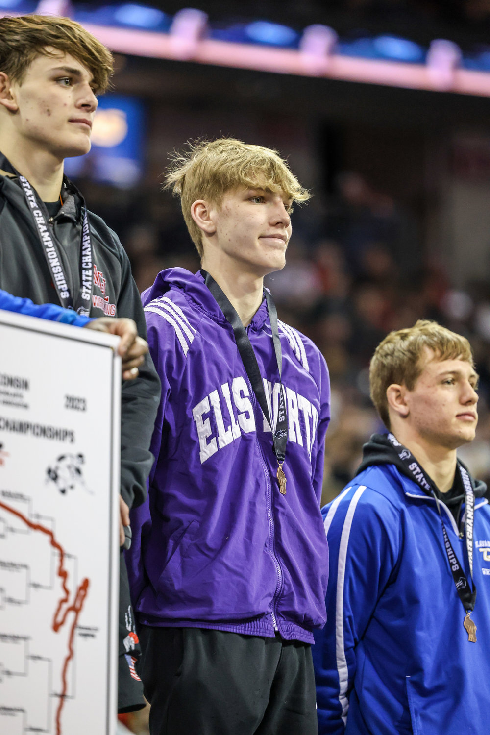 2-25-23 Ellsworth's William Penn stands on the podium after recieving his fourth place medal at the WIAA state wrestling tournament. Penn went 3-2 en route to the podium finish...Nate Beier/GX3 Media