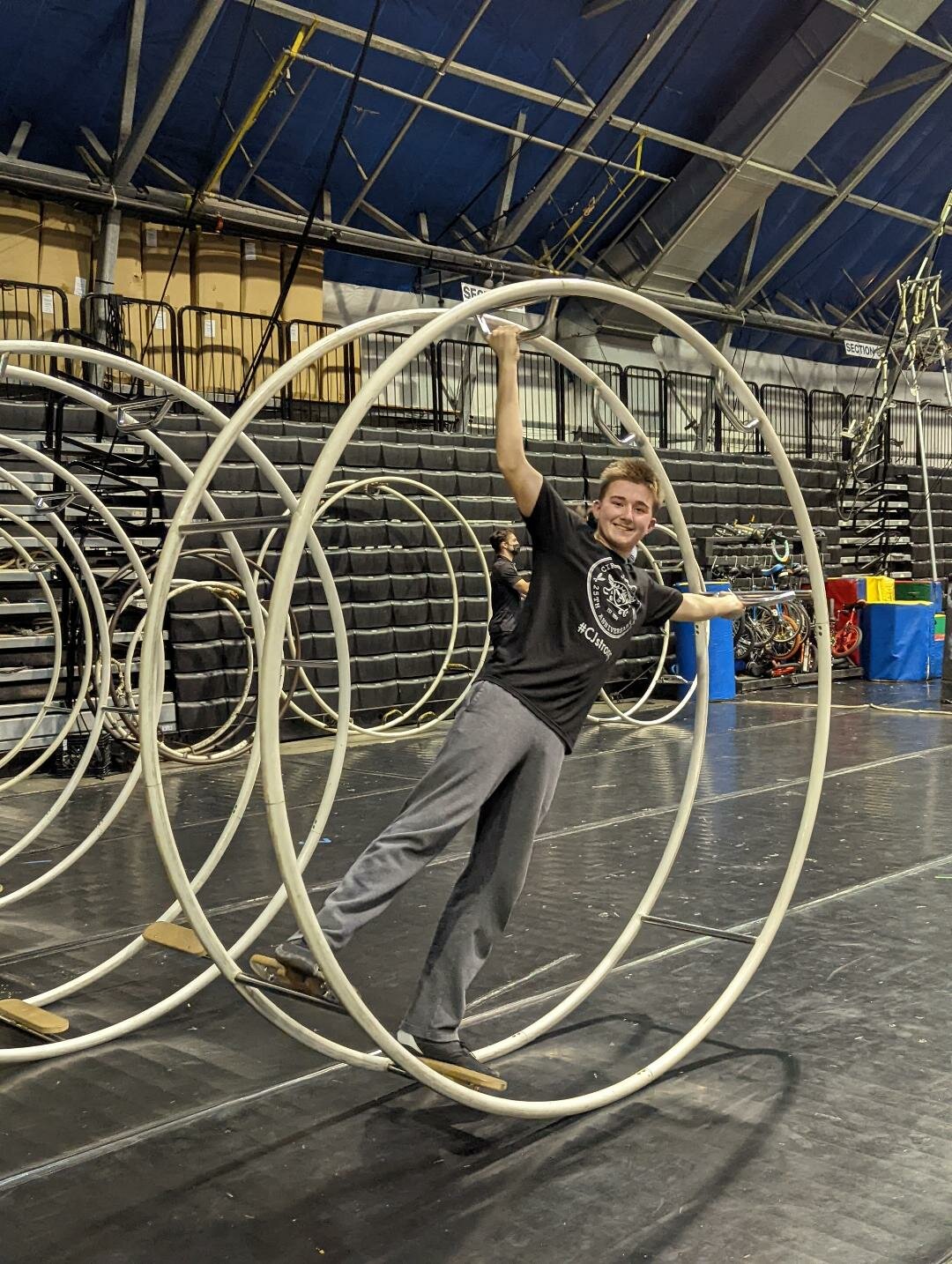 Aidan Bowman practicing a routine in the German wheel at Circus Juventas.
