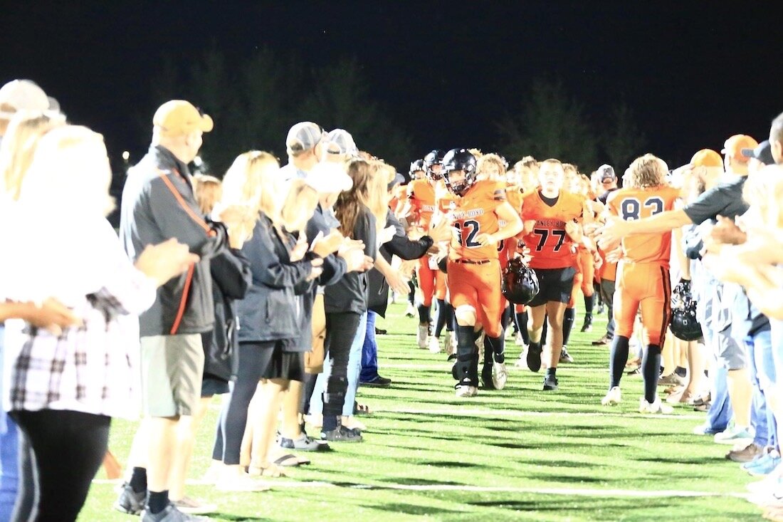 During halftime the parents were announced (for parent's night) and formed a tunnel for the players to return to the field.