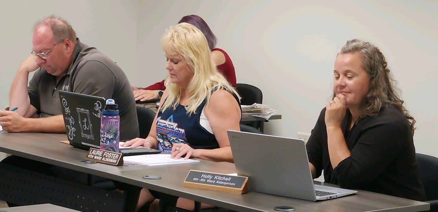 Council members Mike Henke, Laurie Foster, and Holly Kitchell listened to information regarding a future splash pad presented by Kristi Weiland, President of the SCA, at the September 5th meeting.