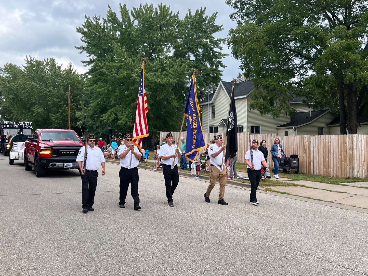 The Prescott American Legion Post Color Guard was one of the lead entrants in the Prescott Daze Grand Parade on Sunday, with viewers standing at attention as the flags were marched past. The parade featured nearly 50 floats.