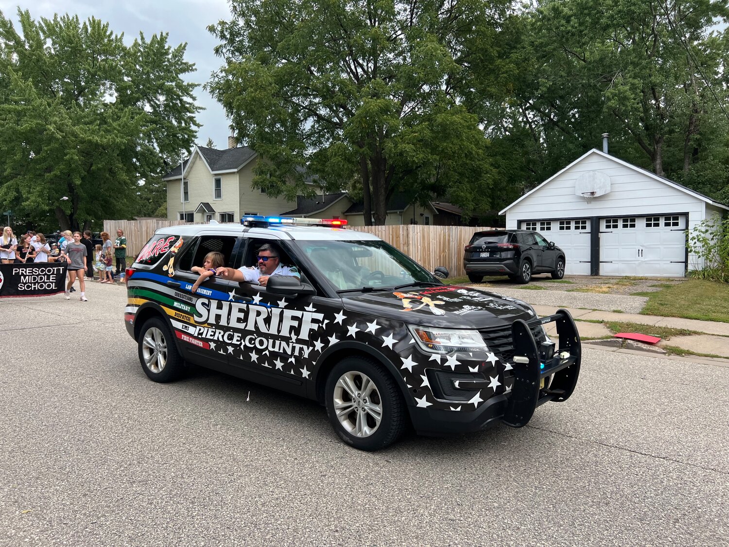 Pierce County Sheriff Chad Koranda took aim with lollipops for kids lining the Prescott Daze Parade route on Sunday.