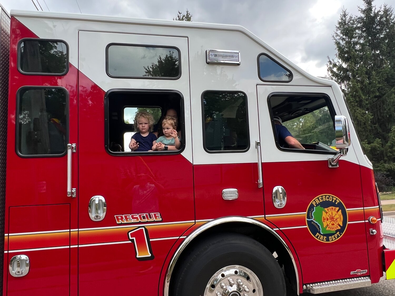 Kids waved from the Prescott Fire Department trucks that formed an impressive procession early in the Prescott Daze Parade Sunday afternoon.