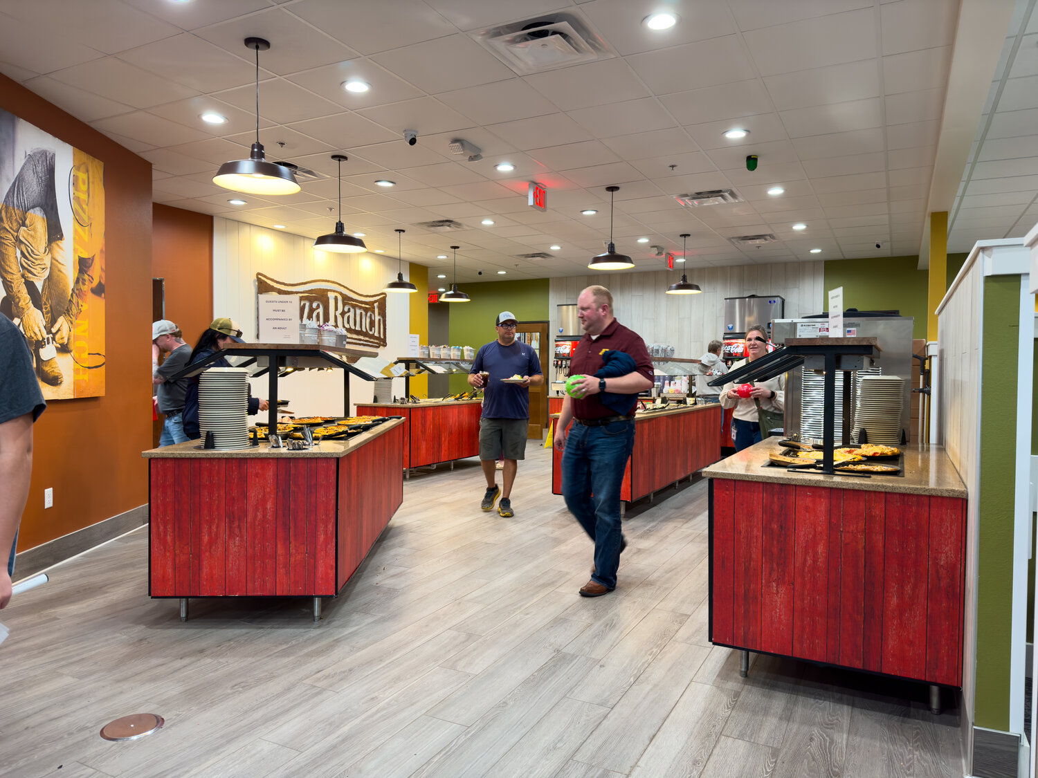 The heart of Pizza Ranch is the buffet. The new look is inviting and has a ton of space to move around while choosing pizza, chicken and sides and salad.