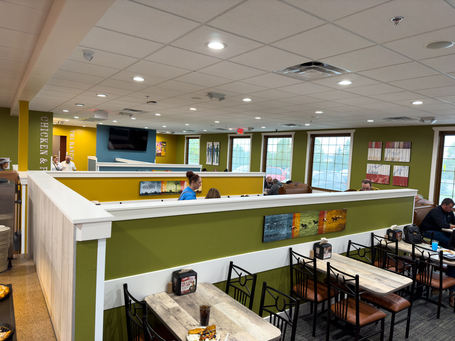 The Twin Cities area’s newest Pizza Ranch is their newest design concept with a much more open feel and brighter colors compared to their historically rustic look.