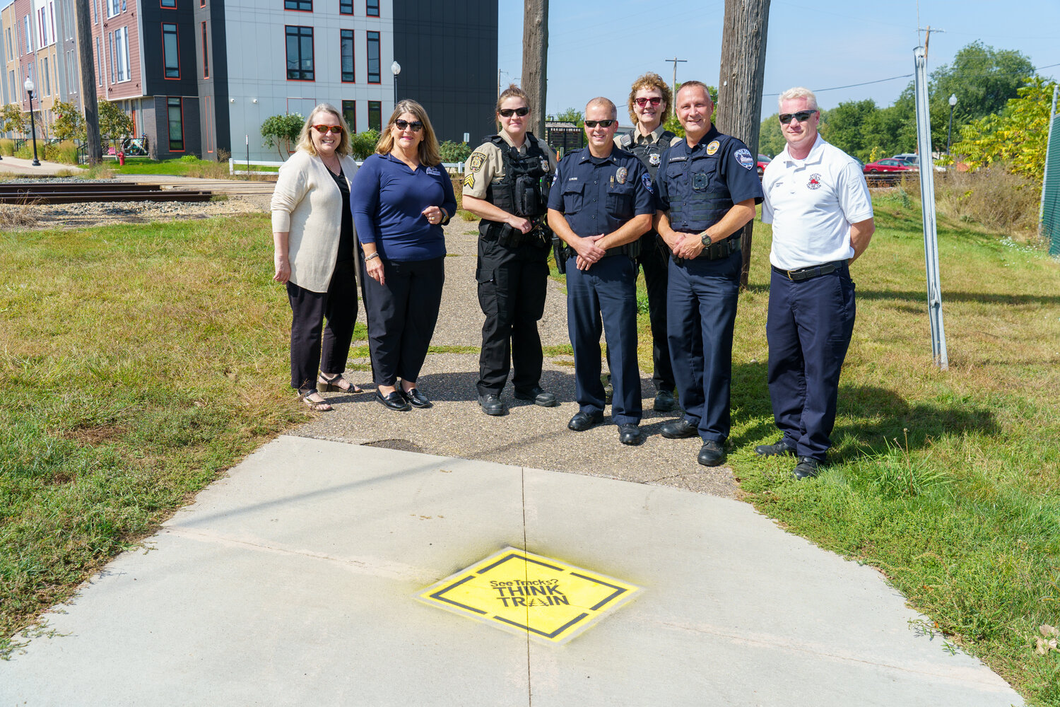 City of Hastings officials and CP Rail officials met to discuss Rail Safety Week and issues around keeping people safe near train tracks. Left to Right: City Attorney Kelly Murtaugh, Mayor Mary Fasbender, Sergeant Micki Mair, Chief David Wilske, Detective CPKC Railroad Police Tracy Bergerson, Deputy Chief Bryan Schowalter and Fire Chief John Townsend.