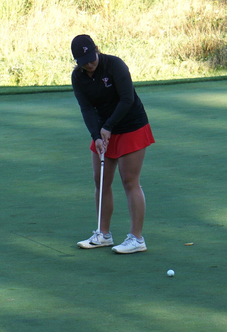 Layla Salay putting for par on Hole 18 to finish out the opening round of state competition in Madison on Monday.